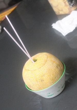 Una foto de Melón con Nescafé y aguardiente de hierbas