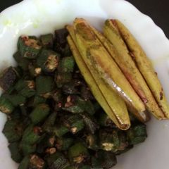 A picture of Lady's finger and pointed gourd fry.