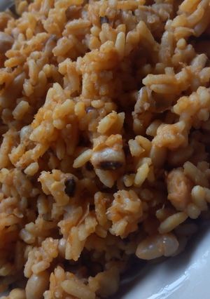 A picture of Jollof rice and beans.