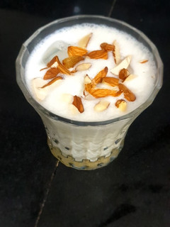 A picture of Thandai milkshake shots.