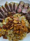 Beef Fat Fried Rice Topped with Crispy Beef Bits and Garlic