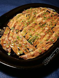 Una foto de Boquerones en vinagre de modena y cebolletas