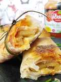 Rollitos mixtos de navidad con cebolla caramelizada y tomate