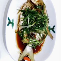 A picture of Steam Pomfret with spicy black bean paste.