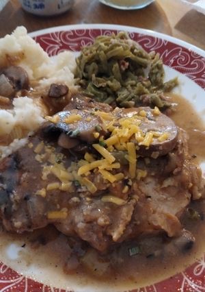 A picture of Smothered Pork Chops GF DF.