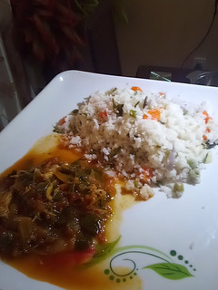 A picture of Miyan zogale with basmati rice alkubus.