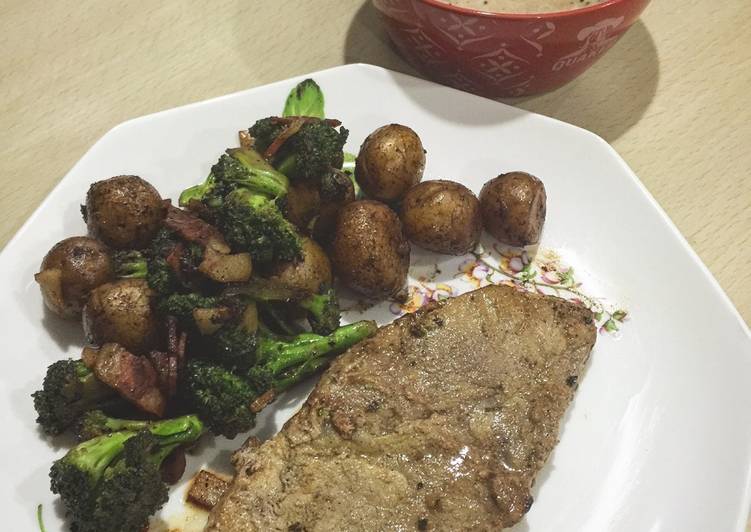 Mustard pork chop with braised baby potato and brocolli in beef broth & mushroom soup
