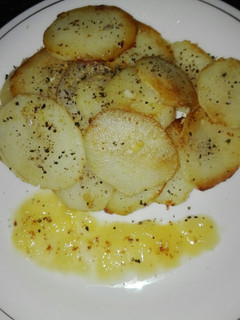 A picture of Roasted Potato Roundels With Mango Sauce.