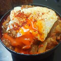 A picture of Curry Udon with egg.