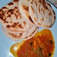 Naan bread with pumpkin soup