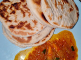 Naan bread with pumpkin soup