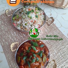 A picture of Fried rice with Chilli Chicken.