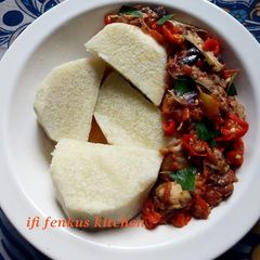 A picture of Boiled yam and fish sauce.