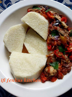 A picture of Boiled yam and fish sauce.