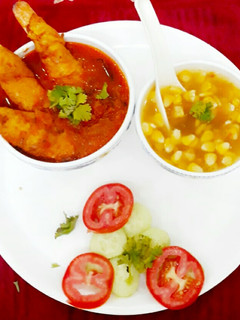 A picture of SoyaChaap Curry with Sweetcorn Soup.