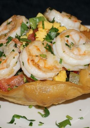 A picture of FRIED TORTILLA HATS WITH BLACK BEAN SALAD AND GARLIC SHRIMP, JON STYLE.