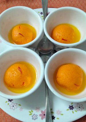 A picture of Orange flavoured Rasgulla.
