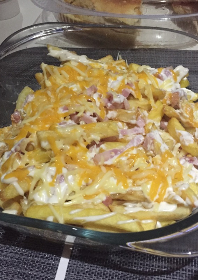 Una foto de Bacon-cheese fries (estilo Foster's)