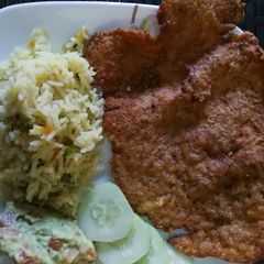 A picture of Chicken milanesa.