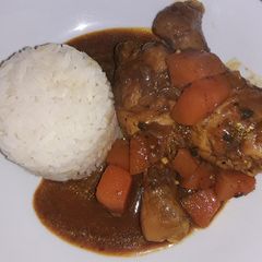 A picture of Chicken stew with butternut.