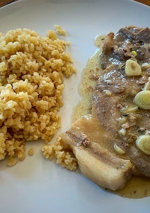 Una foto de Chuletas de cerdo al ajillo