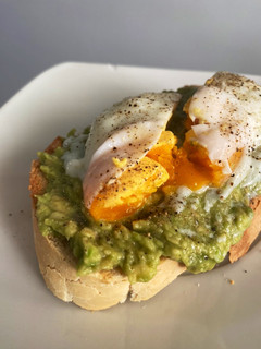A picture of Avocado Toast with Poached Egg.