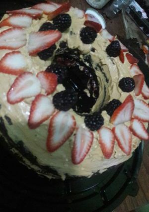 Una foto de Pastel de chocolate con queso y zarzamora
