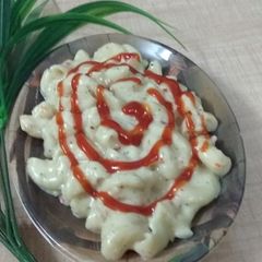 Cheesy Macroni in White Sauce A picture of Cheesy Macroni in White Sauce.