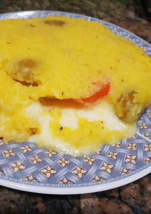 Una foto de Polenta rellena a la napolitana (sin gluten)