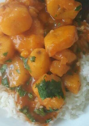 A picture of Stewed bananas served with rice.