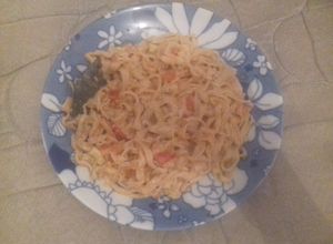 Una foto de Masa tradicional para fideos con una salsa simple de tomate