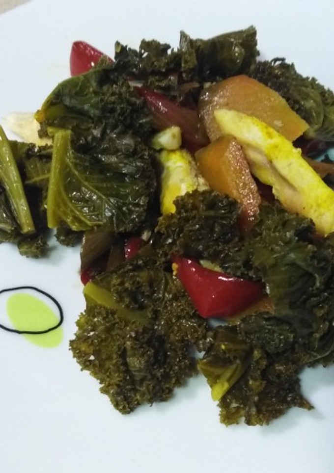 Una foto de Pollo con kale