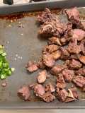 Nyama choma (goat meat)