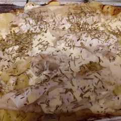Una foto de Merluza al horno con papas a la crema