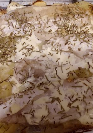 Una foto de Merluza al horno con papas a la crema