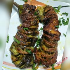 A picture of Baked cheesy Sliced brinjal.