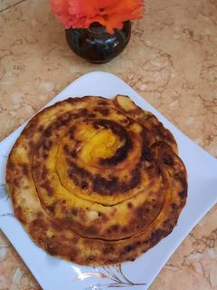 صورة لوصفة مسمن او ملوي محشي بطريقة جديدة ومبتكرة 🫓😋