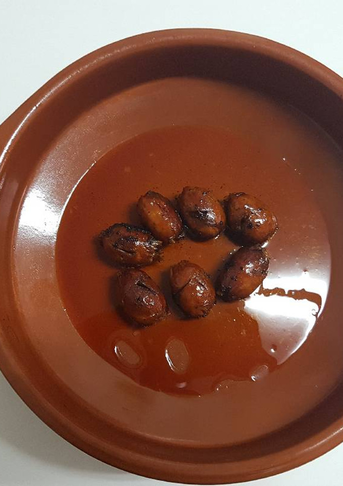 Una foto de Chorizos pequeños al vino blanco