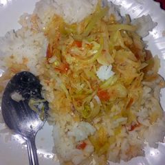 A picture of Rice with fried cabbages.