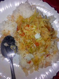 A picture of Rice with fried cabbages.