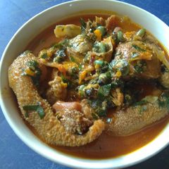 A picture of Spicy Achi Soup with Goat Meats.