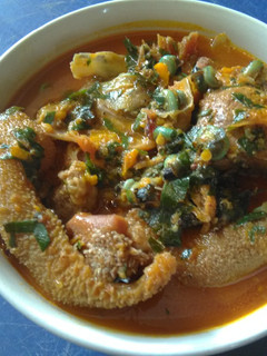 A picture of Spicy Achi Soup with Goat Meats.