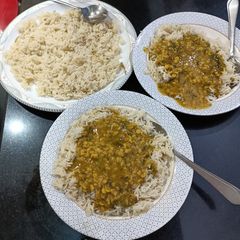 A picture of Fried rice 🍚 with daal.