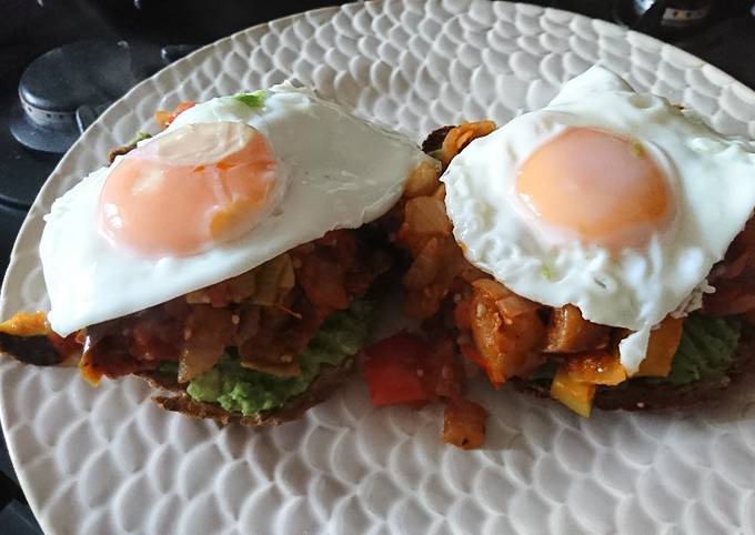 Fried Eggs on Ratatouille on spicy Avocado on Sourdough..