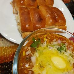 A picture of Butter cheese pav bhaji.