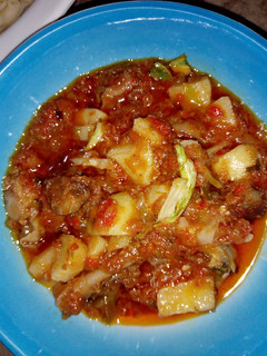 A picture of Stew with cabbage an patato.