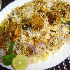 A picture of Charcoal Smoked Chicken Tikka Biryani.