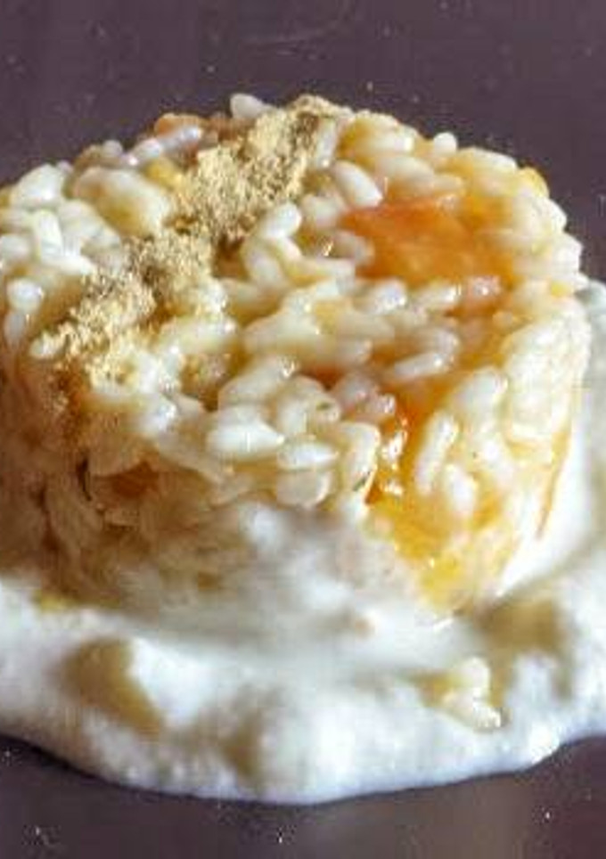 Una foto de Risotto con calabaza y crema queso pecorino