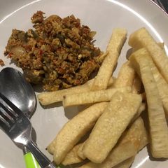 A picture of Fried yam and egg sauce.