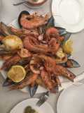 Mariscada a la plancha con salsa verde